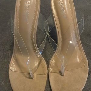 Vey stylish high heal clear thong shoes! Will go with any look. Size 10